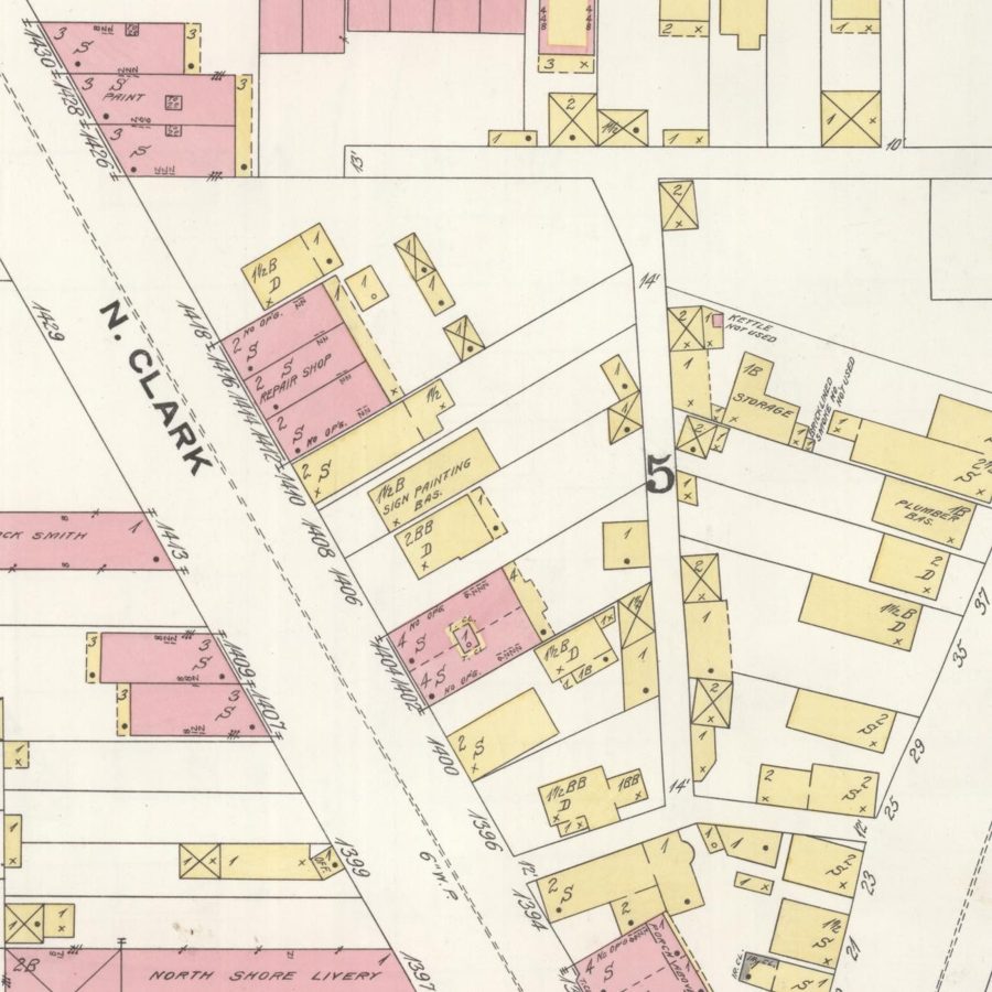 Detail of an 1894 Sanborn fire-insurance map of the North Clark Street block, with buildings colored by construction type